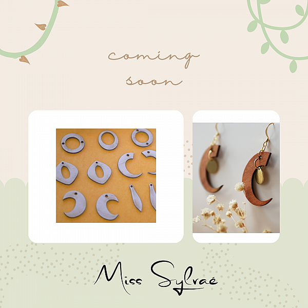 Tr&auml; m&aring;nen h&auml;ngande &ouml;rh&auml;ngen i gr&ouml;n metallic och brunt