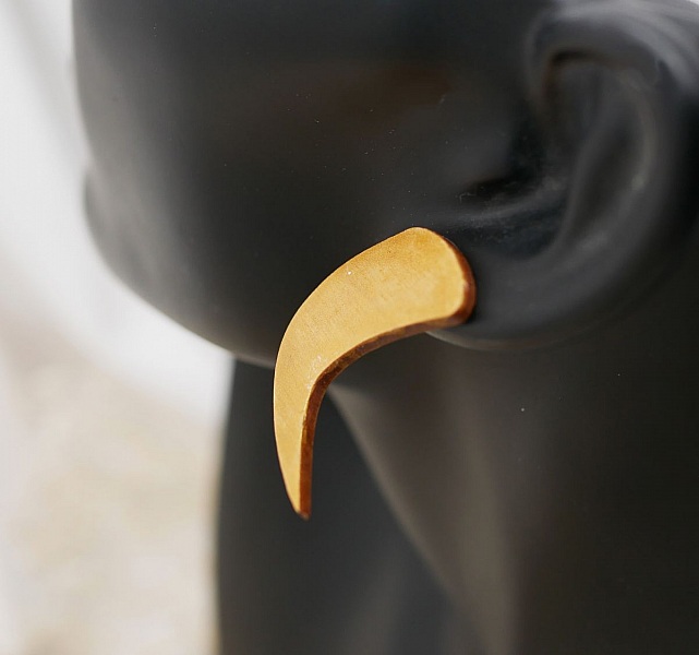 Grafiska &ouml;rh&auml;ngen i guldpl&auml;terat tr&auml;