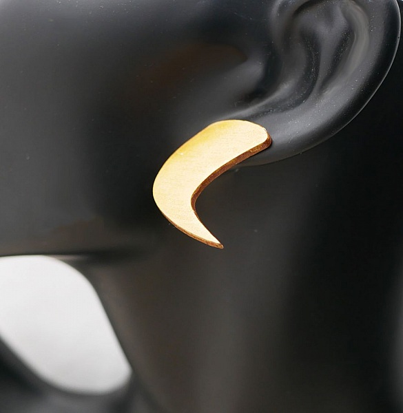 Grafiska &ouml;rh&auml;ngen i guldpl&auml;terat tr&auml;