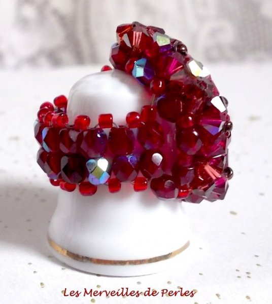 Orkidéring med Swarovski-kristallfacetter och spinnare