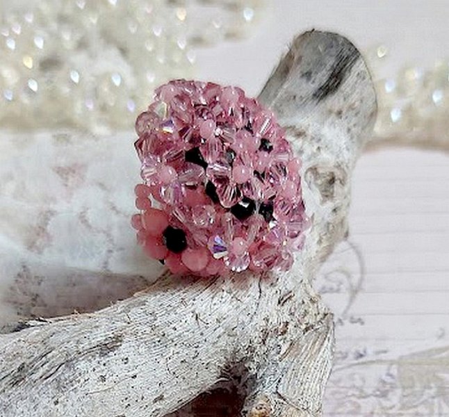 Anemonering med facetter och tupies i Swarovski-kristall