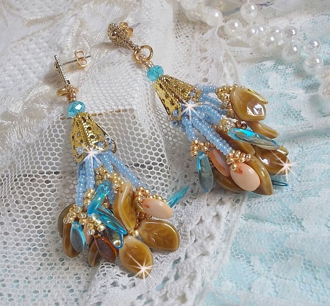 Boucles d'oreilles artisanales style amérindien en nacre et perles.