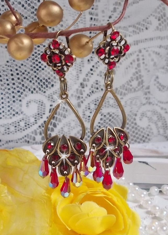 BO Irresistible Ruby Collection monterad på ljusstakar med Swarovski-kristaller.