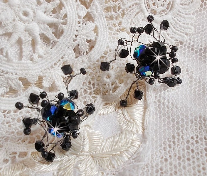 BO Douce Nuit med snurrande toppar av Swarovski-kristall och glasfacetter.