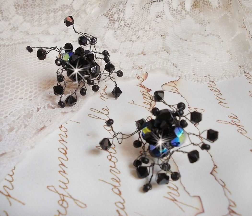 BO Douce Nuit med snurrande toppar av Swarovski-kristall och glasfacetter.