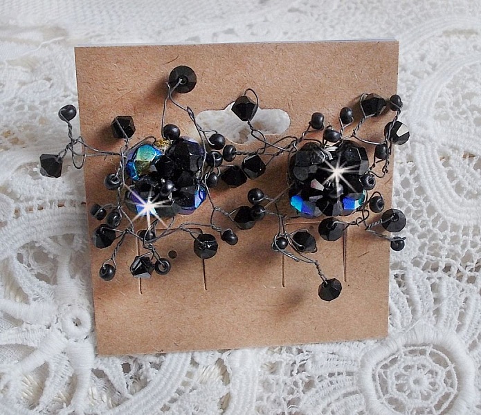 BO Douce Nuit med snurrande toppar av Swarovski-kristall och glasfacetter.