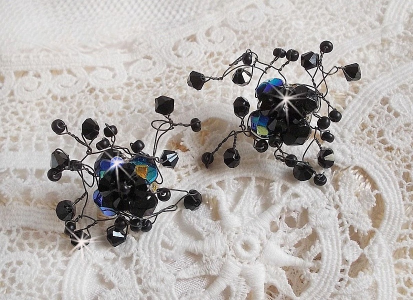 BO Douce Nuit med snurrande toppar av Swarovski-kristall och glasfacetter.