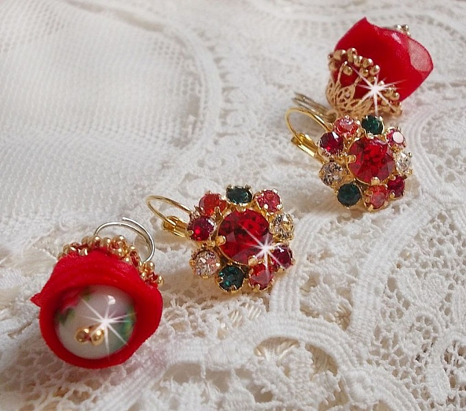 BO Mia broderad med Swarovski-kristaller, orange zirkoniumstenar, Fimo-p&auml;rlor och fr&ouml;p&auml;rlor.