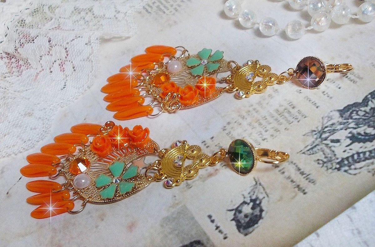 BO Roseraie Orange Roses skapad med Swarovski crystal rhinestones och cabochons, blommor, orange dolkar, glas cabochons och kvalitetstillbehör.