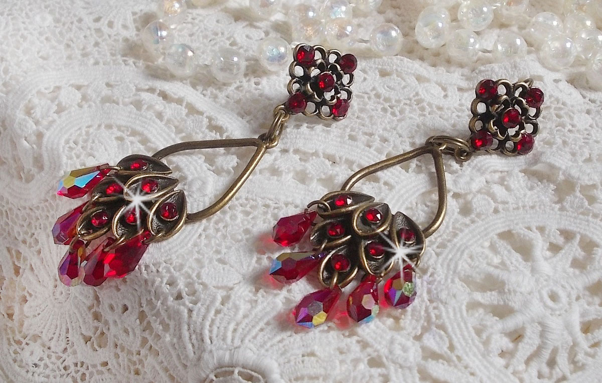 BO Irresistible Ruby Collection monterad på ljusstakar med Swarovski-kristaller.
