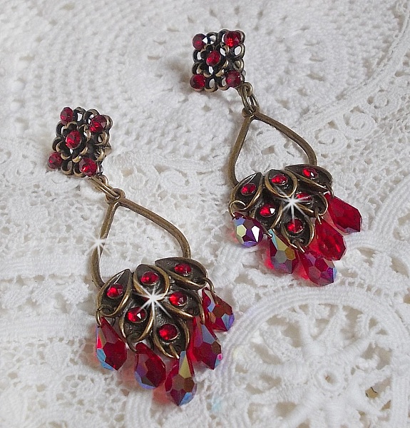 BO Irresistible Ruby Collection monterad p&aring; ljusstakar med Swarovski-kristaller.