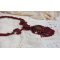 Rubby One halsband broderat med Swarovskikristaller och en keramisk cabochon