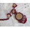 Rubby One halsband broderat med Swarovskikristaller och en keramisk cabochon