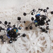 BO Douce Nuit med snurrande toppar av Swarovski-kristall och glasfacetter.