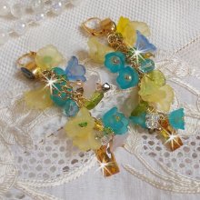 BO Bella Yellow monterad med Swarovski-kristaller, frostat blommor och pärlor. 