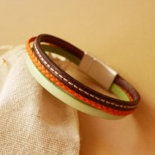 Manschettarmband i flera läder med mandel, orange flätor och Bordeaux-sömmar